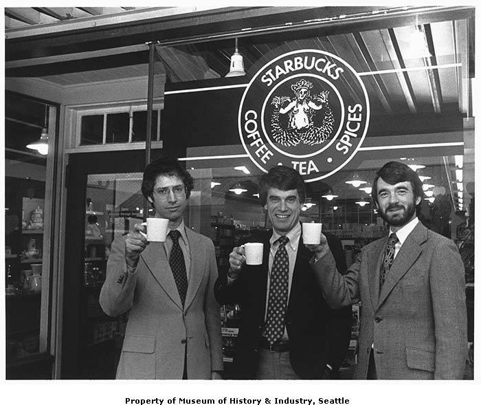 Starbucks founders posing outside their store